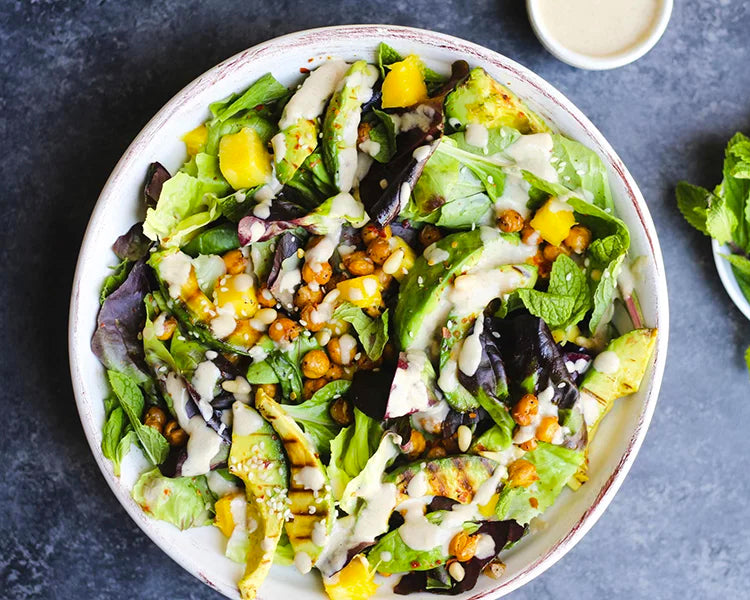 Grilled Avocado Salad with Mango And White Bean Tahini Dressing